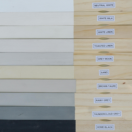 Colour samples painted on wood and photographed in daylight