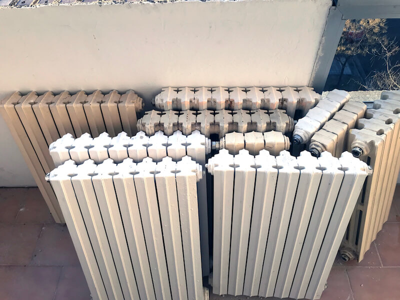 radiators removed from the wall and ready for painting