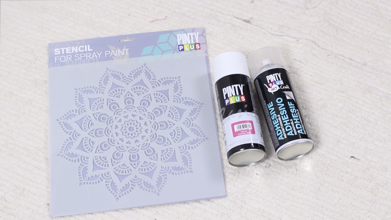 using a stencil with spray paints
